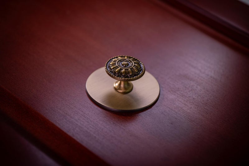 trust4care 9 Pack Euro-Style Brushed Antique Brass Kitchen Cabinet Knobs, Zinc Alloy Vintage Drawer Knobs, Aged Gold Round Dresser Handles with Floral for Bathroom & Furniture, 1.25" Diameter - Image 3